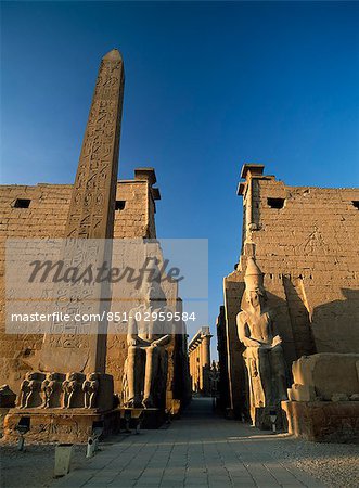 Obelisk and colossi of Ramses 2nd,Luxor Temple,Luxor,Egypt