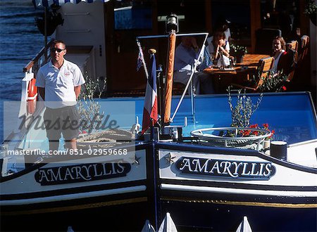 Deckhand on the bow of The Amaryllis,Fragnes,Burgundy,France.