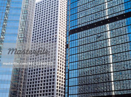 Reflections of office blocks in other blocks,Hong Kong,China