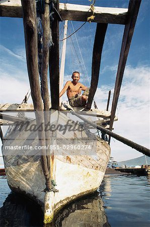 Boutonese sailor and trading boat,Bitung Harbour,North Sulawesi,Molluccas (Maluku) Indonesia