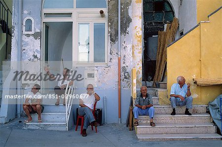 Old men in a fishing village,Chiaorella,Procida,Italy