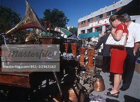 People looking at antiques at market,Madrid,Spain