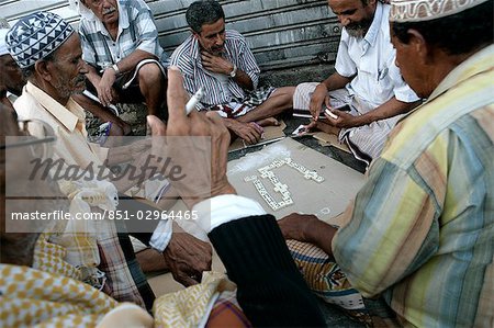 Group of men playing dominos,Aden,Yemen