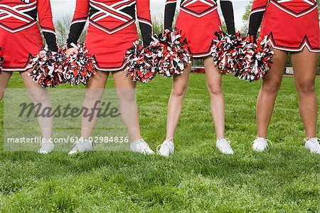 Cheerleaders with pom poms