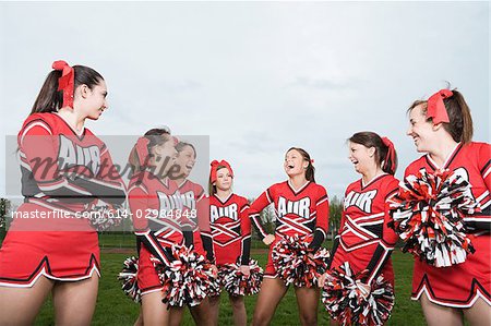 Cheerleaders laughing