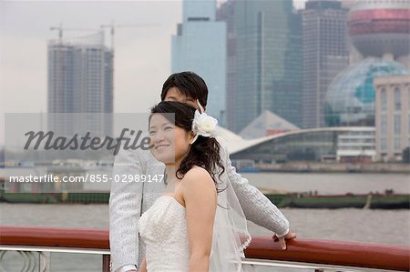 A newly wed couples at the Bund, Shanghai, China