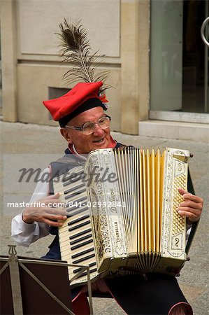 Musician near Main Market Square, Krakow (Cracow), Poland, Europe