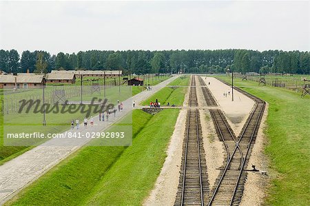 Railway line and platform where prisoners were unloaded and separated into able bodied men, kept for work, and woman and children who were taken to gas chambers, Auschwitz second concentration camp at Birkenau, UNESCO World Heritage Site, near Krakow (Cracow), Poland, Europe