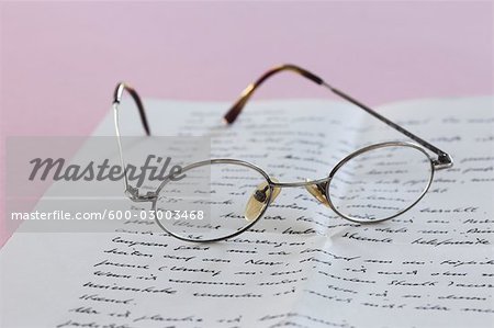Still Life of Eyeglasses and Letter