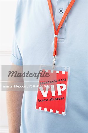 Man Wearing a VIP Pass