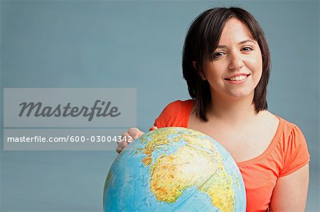 Portrait of Woman Holding a Globe