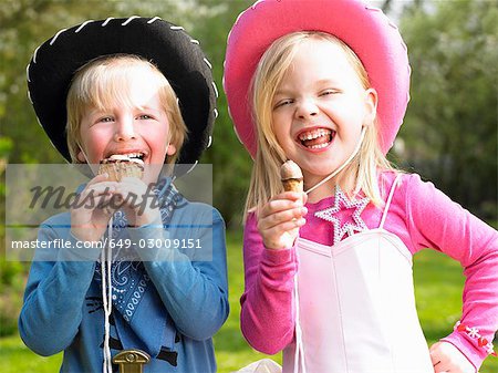 Kids with costume,eating ice-cream