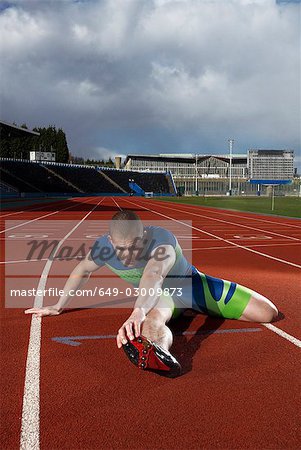 athlete stretching