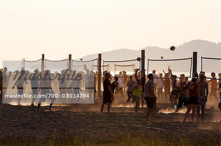 Group of People Playing Beach Volleyball