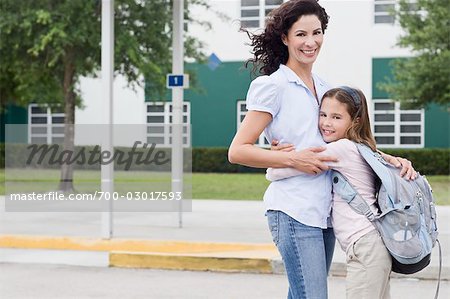Mother Taking Daughter to School