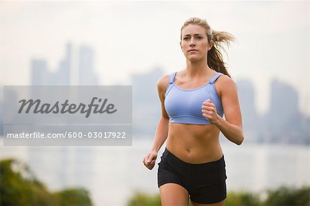 Woman Running in Park, Seattle, Washington, USA