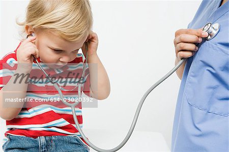 Little boy and nurse with stethoscope
