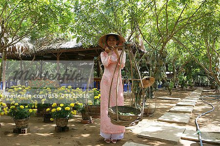 A Vietnamese woman in national costume,Cu Lao Thai Son Island,Vietnam