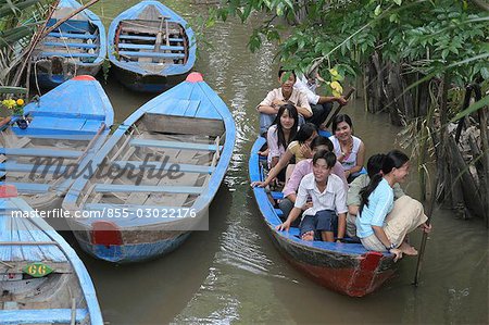 A group of young people on a boat at Mekong River,My Tho,Vietnam