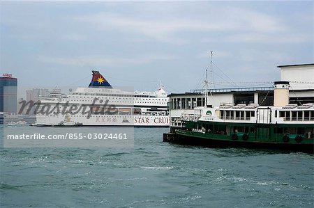 A cruise ship by the Star Ferry Pier in Victoria Harbour,Hong Kong