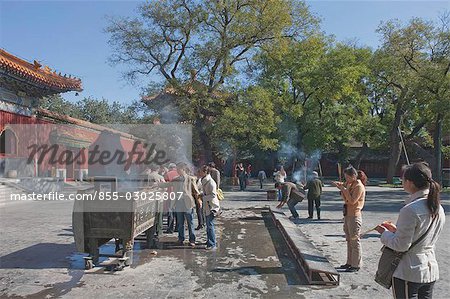 People worshipping at Yonghegong (Lhama temple),Beijing,China