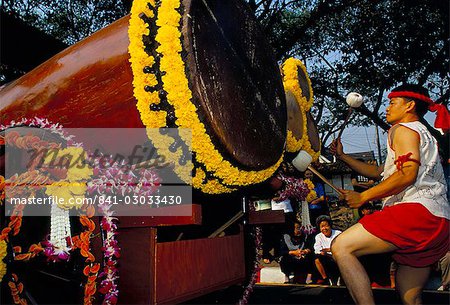 Young Thai man playing drums in parade, Flowers Festival, Chiang Mai, Thailand, Southeast Asia, Asia