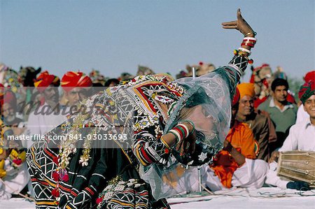 Woman dancing during desert festival, Bikaner Desert Festival, Rajasthan state, India, Asia
