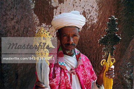 Portrait of a man holding Christian symbols,Gabriel and Raphael,Bieta Mercurios,Lalibela,Wollo region,Ethiopia,Africa