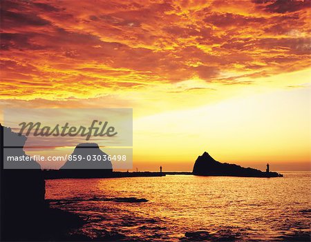 Towering Rock Formations Rising from The Sea