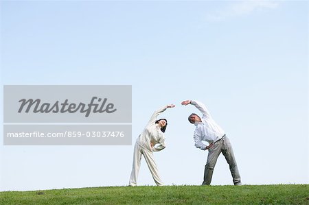 Older Couple Stretching