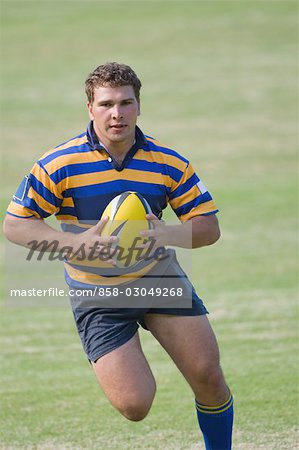 Rugby player running with ball