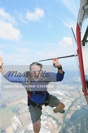 Man shouting and jumping from plane