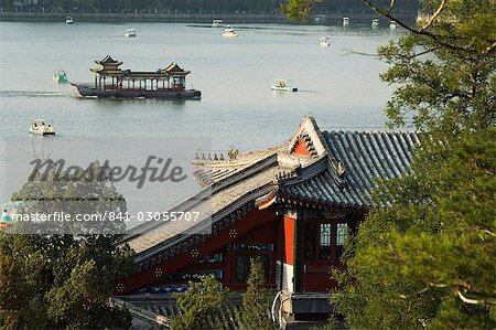 Chinese style boats on a lake in Beihai Park, Beijing, China, Asia