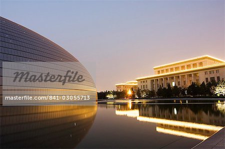 Soviet style Great Hall of the People contrasts with The National Theatre Opera House, also known as The Egg designed by French architect Paul Andreu and made with glass and titanium opened 2007, Beijing, China, Asia