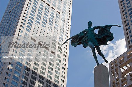 Statue of a woman among high office buildings in Guomao CBD, Beijing, China, Asia