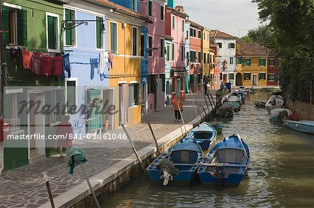 Couloured houses with washing lines, alongside canal, Burano, Venetian lagoon, Veneto, Italy, Europe