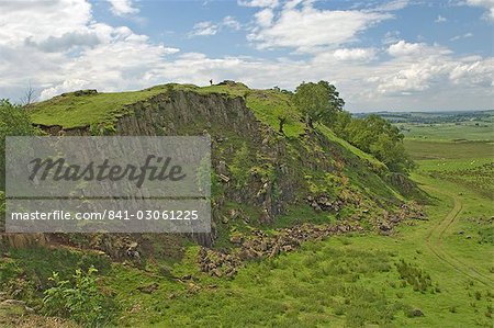 Walltown Crags, walker on the skyline at Turret 45b, Hadrians Wall, Northumbria, England, United Kingdom, Europe Walltown Crags, walker on the skyline at Turret 45b, Hadrians Wall, Northumbria, England, United Kingdom, Europe