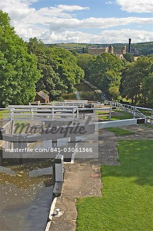 View from the top of the five lock ladder on the Liverpool Leeds canal, including a mill, at Bingley, Yorkshire, England, United Kingdom, Europe