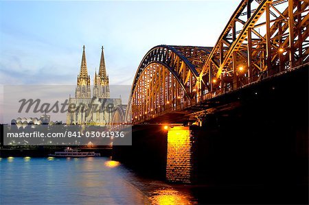 Cologne cathedral and Hohenzollern bridge at night, Cologne, North Rhine Westphalia, Germany, Europe