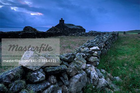 Ruined crofthouse and lowering sky, Yell, Shetland Islands, Scotland, United Kingdom, Europe