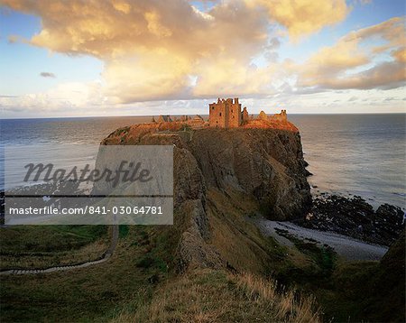 Dunnottar Castle, dating from the 14th century, at sunset, Aberdeenshire, Scotland, United Kingdom, Europe