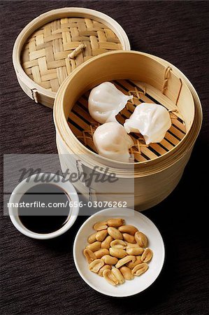 still life of dim sum with bamboo steamer