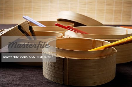 bamboo steamers with chop sticks