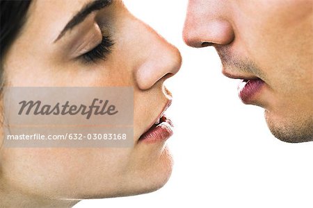 Couple about to kiss, close-up