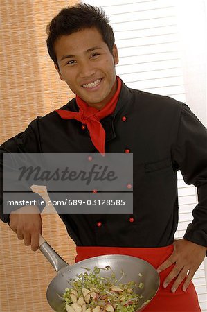 Asian chef with Wok