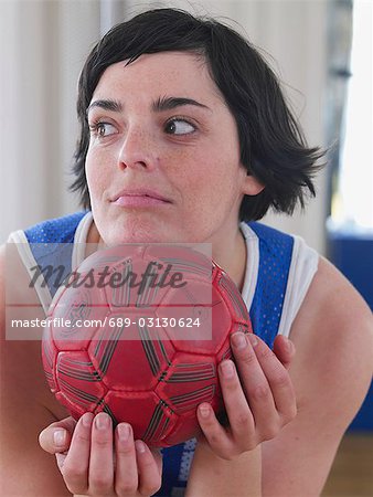 woman with red ball