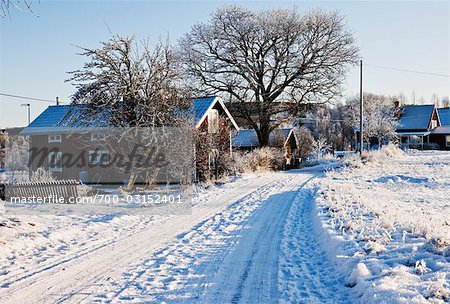 Schneebedeckte Straße, Stora Skedvi, Dalarna, Schweden