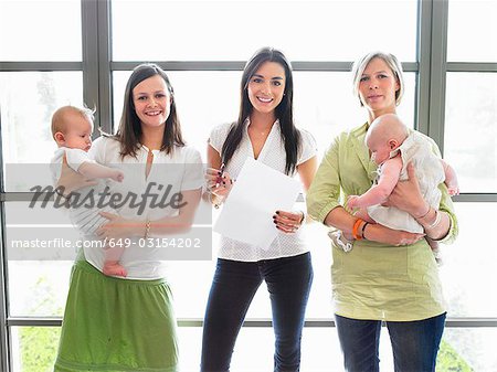 group of women with babies