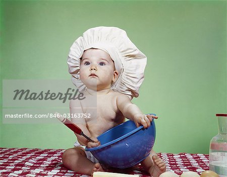 1960s BABY IN CHEF HAT WITH MIXING BOWL AND SPOON