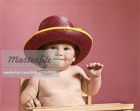 1960s BABY MAKING FACE WEARING RED STRAW HAT